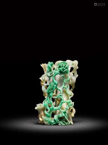 <br />
A carved jadeite 'phoenix and peony' vase, Qing dynas...