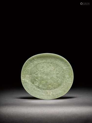 <br />
A celadon jade Mughal-style oval dish, Qing dynasty, ...