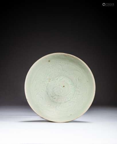 <br />
A carved Qingbai bowl, Song dynasty | 宋 青白釉刻花卉...