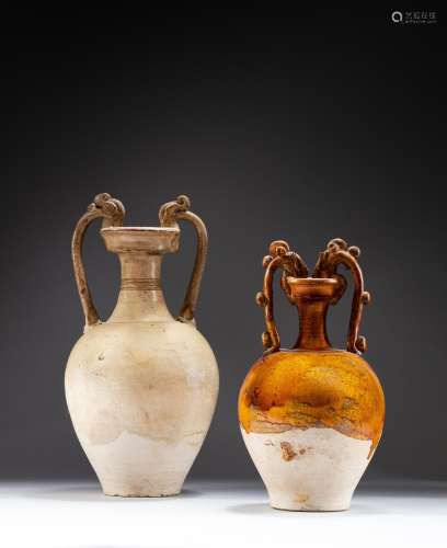 <br />
Two pottery 'amphora' vases, Tang dynasty | 唐 白釉及...