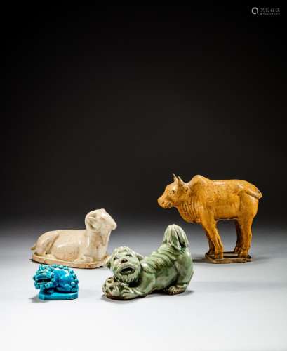 <br />
A group of four variously-glazed animal figures, Tang...
