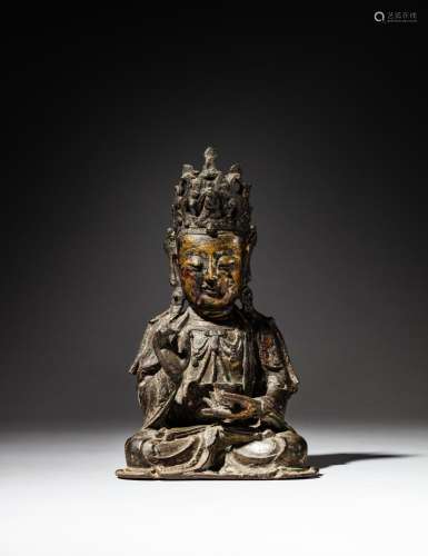 <br />
A parcel-gilt bronze seated Guanyin, Ming dynasty | 明...
