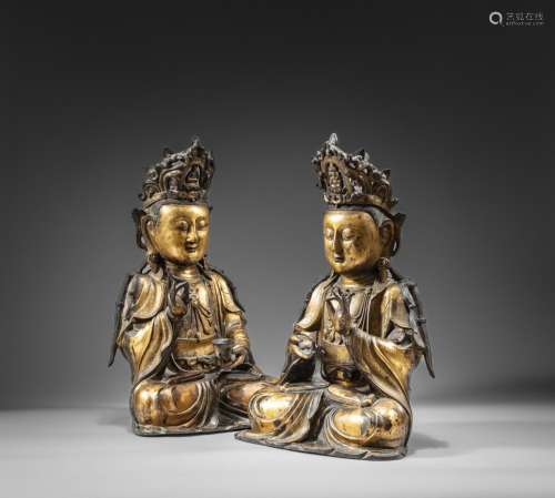 <br />
Two large companion gilt-bronze figures of Bodhisattv...