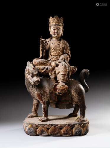 <br />
A large carved wood bodhisattva on a qilin, Ming dyna...