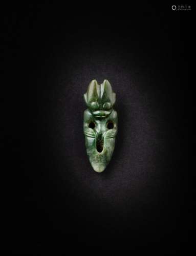 <br />
A green jade 'humanoid figure' pendant, Neolithic per...