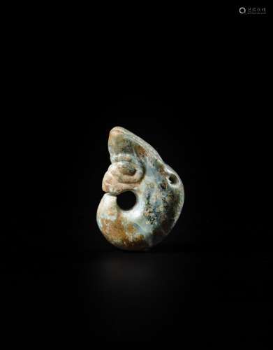 <br />
A partly calcified celadon jade ‘pig dragon’, zhulong...