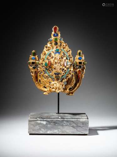 <br />
An embellished gilt-bronze 'Garuda' headcrest, Tibet,...
