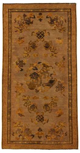 <br />
A metal-thread ‘buddhist lions’ carpet, Qing dynasty,...