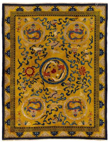 <br />
A large yellow-ground 'dragon' medallion carpet, Late...