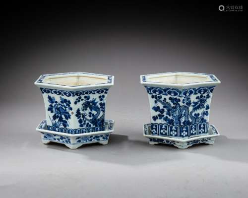 <br />
A pair of blue and white hexagonal 'floral' jardinier...