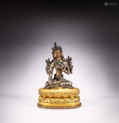 <br />
A silver and gilt-copper figure of White Tara, Tibet,...