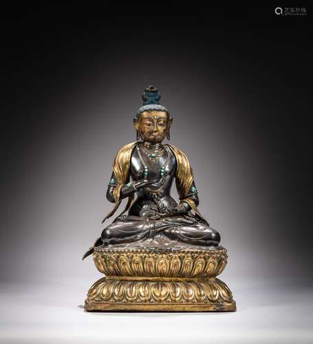 <br />
A gilt-copper and silver figure of Vajradhara, Tibet,...