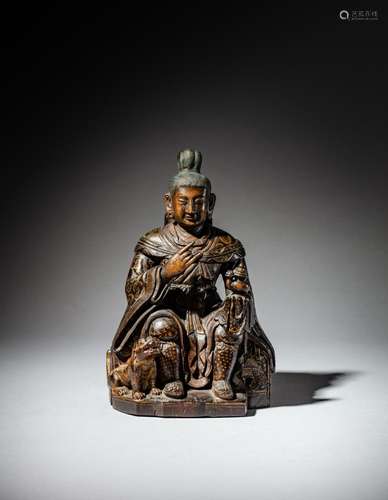 <br />
A polychrome wood figure of the luohan attendant Dhar...