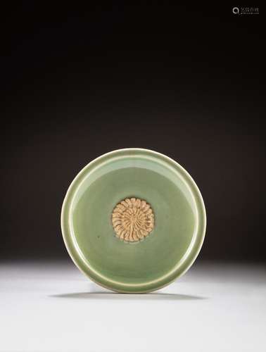 <br />
A 'Longquan' celadon-glazed and biscuit-decorated dis...