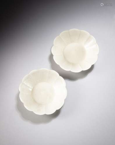 <br />
A pair of Qingbai floral-shaped saucer dishes, Song d...