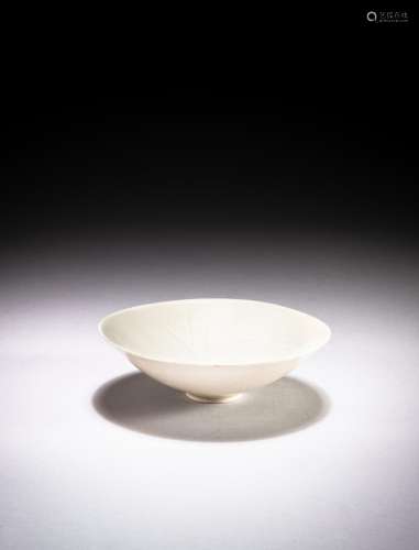 <br />
A carved 'Ding' ‘lotus’ bowl, Song dynasty | 宋 定窰蓮...