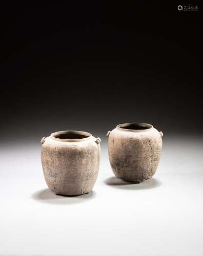<br />
A pair of small grey pottery handled jars, Eastern Zh...