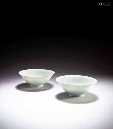 <br />
A pair of carved Qingbai 'floral' bowls, Song dynasty...