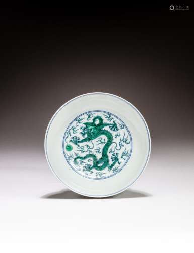 <br />
An underglaze-blue and green-enamelled 'dragon' dish,...