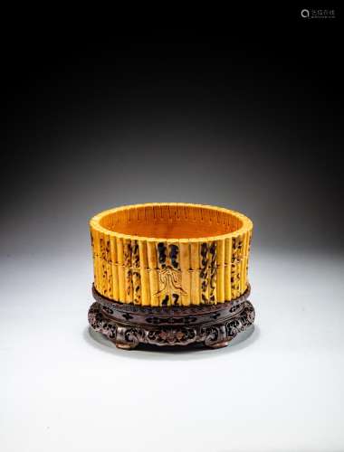 <br />
A yellow-glazed 'bamboo' washer, Qing dynasty, 18th -...