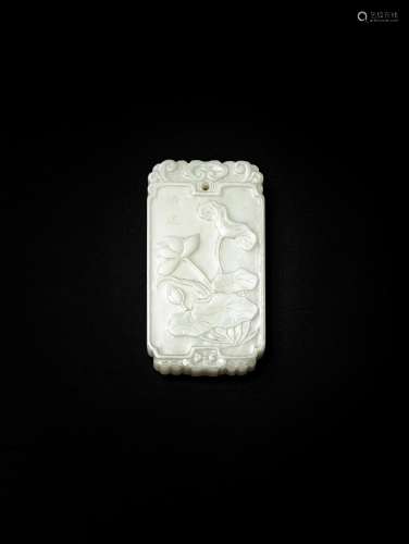 <br />
A white jade 'lotus' plaque, Qing dynasty | 清 白玉蓮...