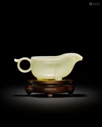 <br />
A pale celadon jade archaistic ewer, yi, Early Ming d...