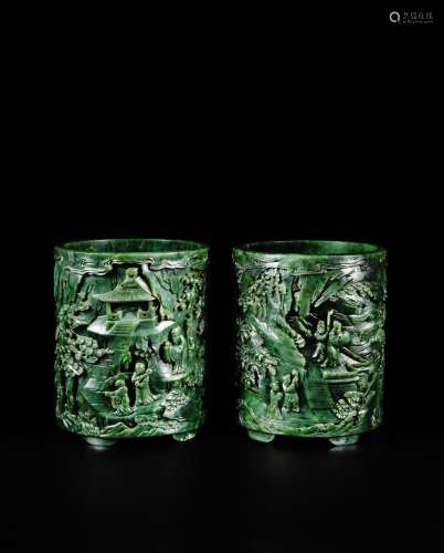 <br />
A pair of spinach-green jade 'Immortals of Mount Fant...