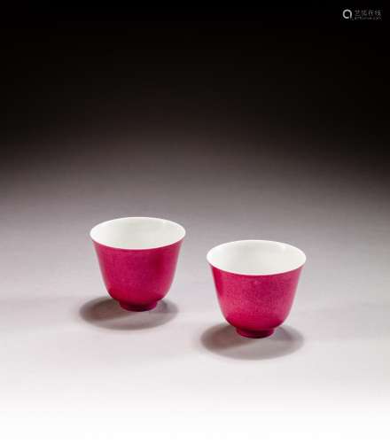 <br />
A pair of ruby-pink enameled wine cups, Marks and per...