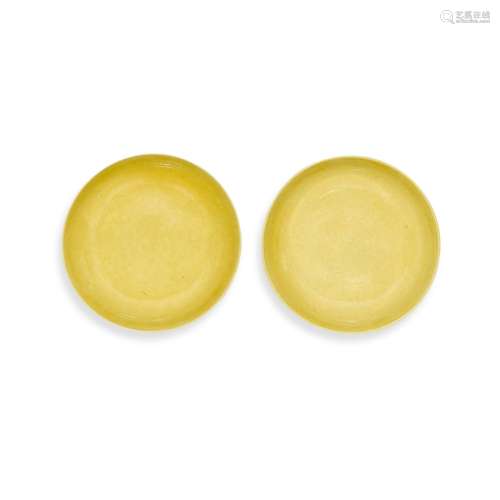 <br />
A pair of yellow-glazed saucers, Marks and period of ...
