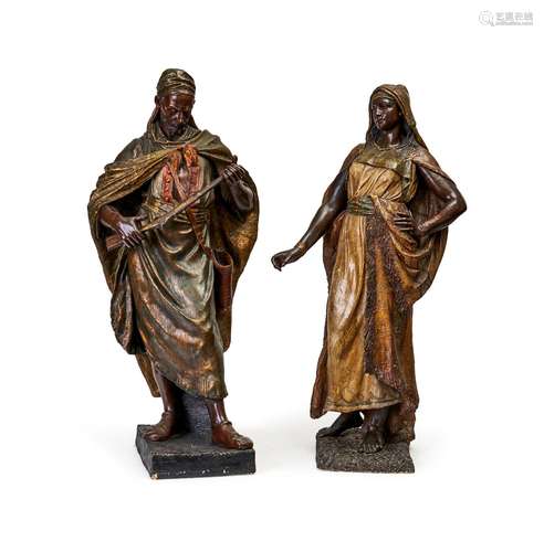 A PAIR OF POLYCHROME TERRACOTTA FIGURES OF AN ORIENTAL LADY ...