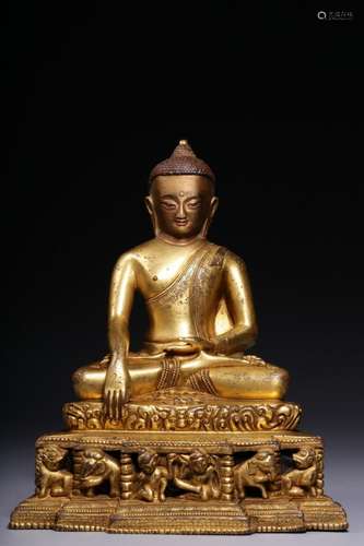 A gilt-bronze seated immovable Tathagata