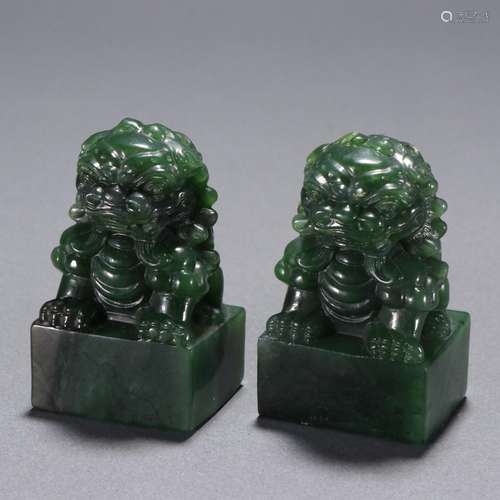 A pair of Hetian jasper lion ornaments