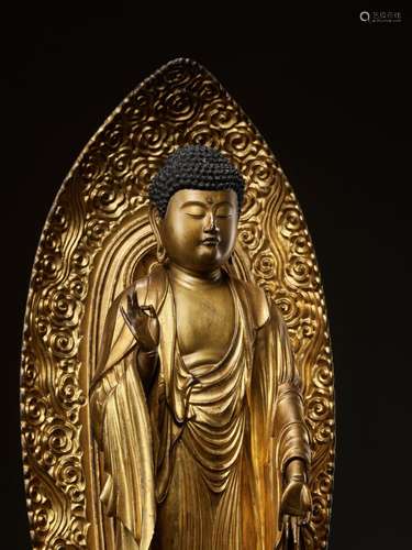 A GILT WOOD FIGURE OF AMIDA NYORAI