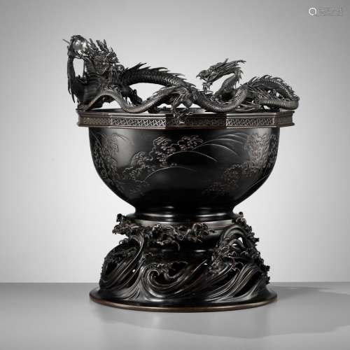 HIDEMITSU: A LARGE AND IMPRESSIVE BRONZE BOWL WITH TWO DRAGO...