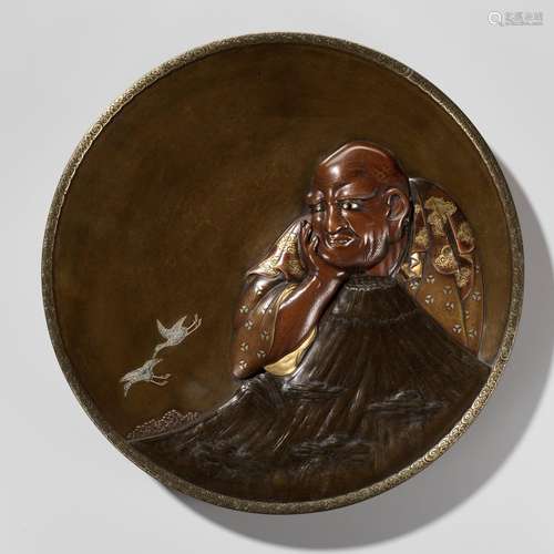 A LARGE AND IMPRESSIVE MIXED METAL DISH DEPICTING WASOBEI AN...