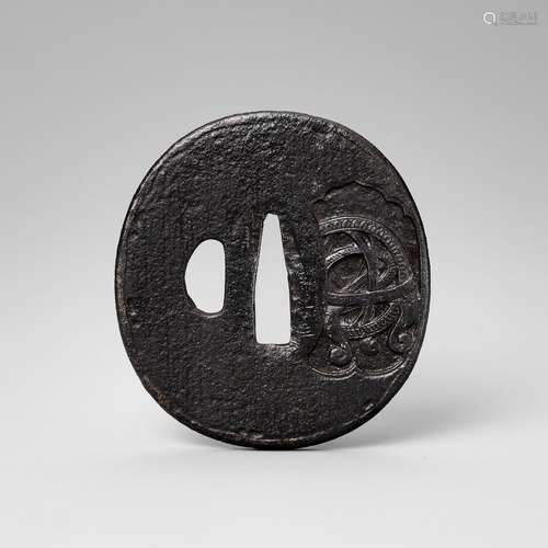 A RARE IRON NAMBAN TSUBA WITH ASTROLOGICAL DESIGN