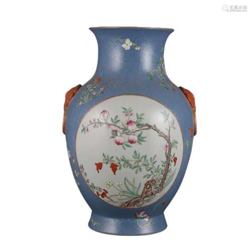 A BLUE GROUND FAMILLE ROSE PANEL FLOWER VASE