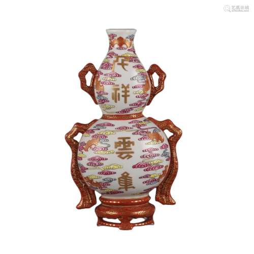 A FAMILLE ROSE CLOUDS DOUBLE-GOURDS FORM WALL VASE