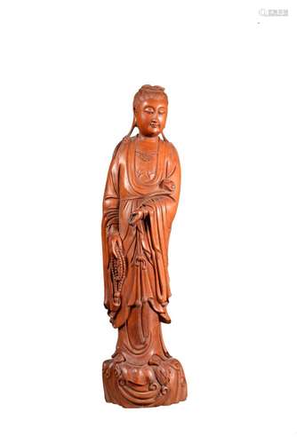 A BOXWOOD CARVED FIGURE OF GUANYIN