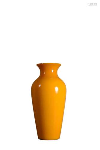 A YELLOW GLASS VASE