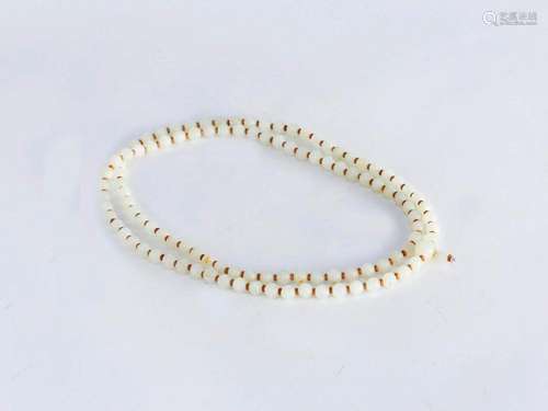 A WHITE JADE 108 BEADS HAND STRING