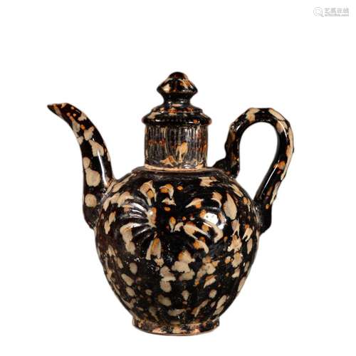 A BLACK GLAZE SPLASHED EWER