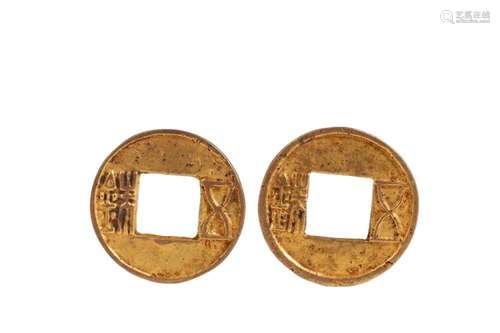 A GILT BRONZE COINS