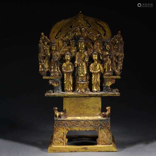 A GILT BRONZE BUDDHA WITH ATTENDANTS