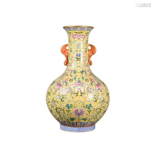 A YELLOW GROUND FAMILLE ROSE PHOENIX RUYI-EARS VASE