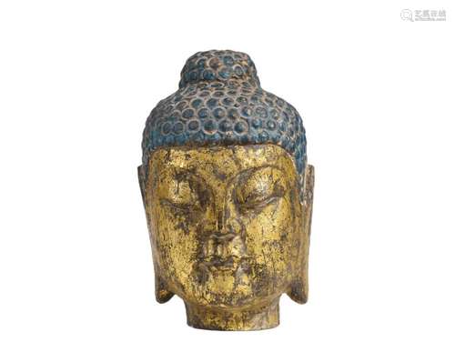 A GILT BRONZE HEAD OF BUDDHA