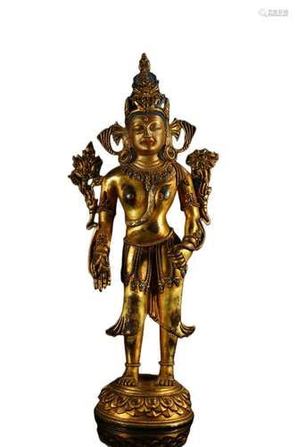 A GILT BRONZE FIGURE OF AVALOKITESVARA