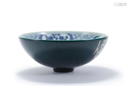 A GREEN GLAZE BLUE AND WHITE DRAGON BOWL