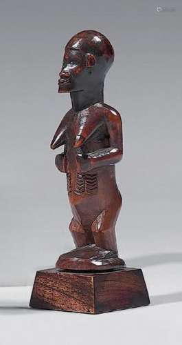 * Statuette Bembé (Congo)
Le personnage féminin figuré