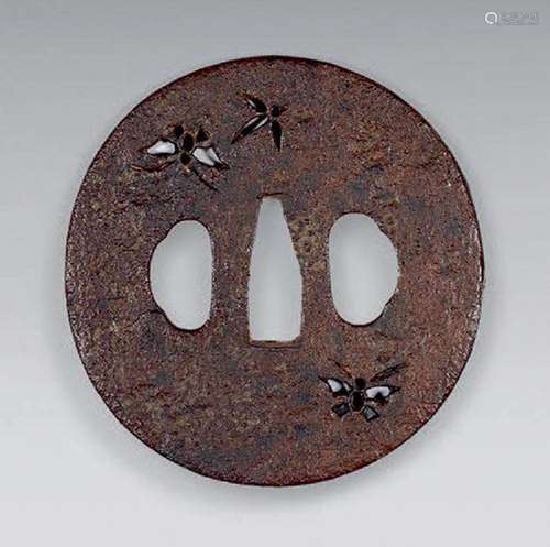 Tsuba en fer à décor ajouré de papillons.
XIXe siècle (